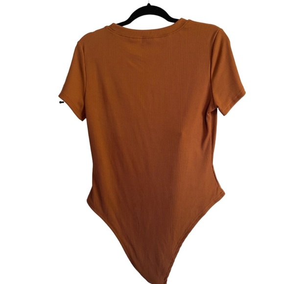 Ribbed Crewneck Short Sleeve Bodysuit
Size L Color Camel - Picture 3 of 12